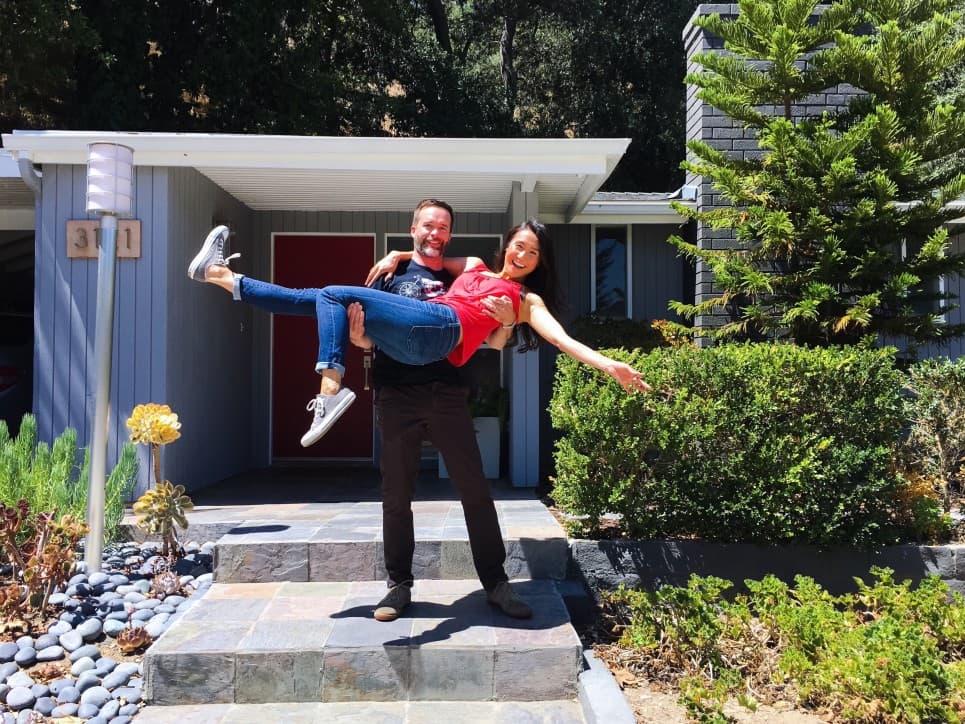 couple super excited about their first home