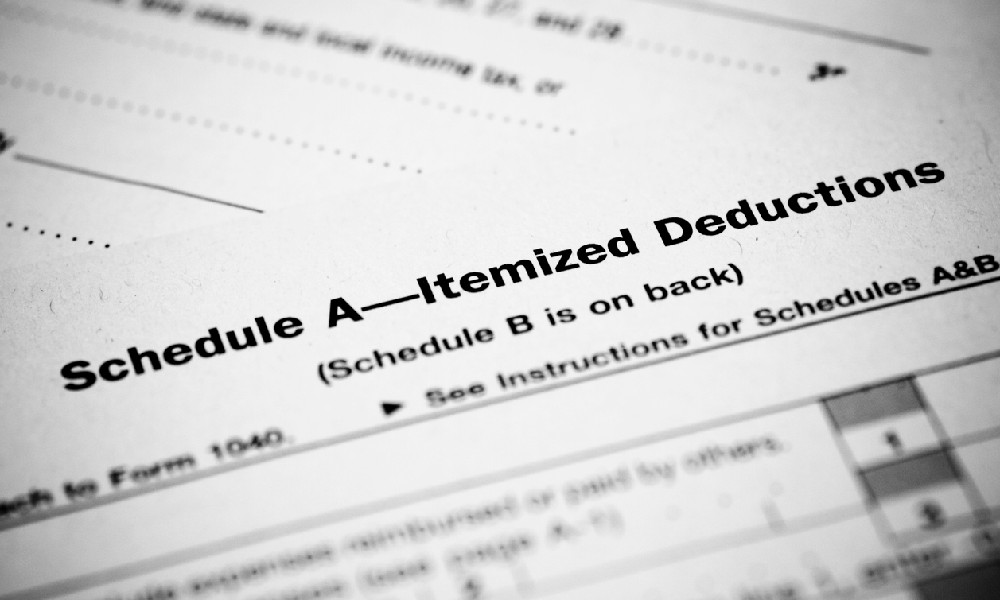 Closeup of a tax deduction form, where a taxpayer would file for a standard mileage rate deduction.