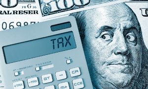 An illustration of Benjamin Franklin on a $100 bill looking at a tax calculator symbolizes issues that come up when you don’t pay state taxes.