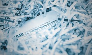 substitute for return 1040 tax form buried in shredded paper