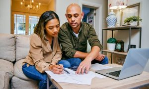 Couple reviewing a California state tax levy in their home
