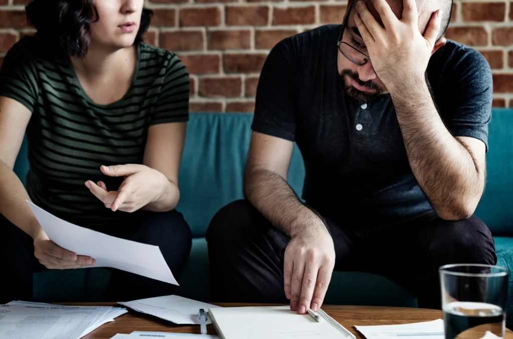 A couple arguing about a tax notice for property seizure.