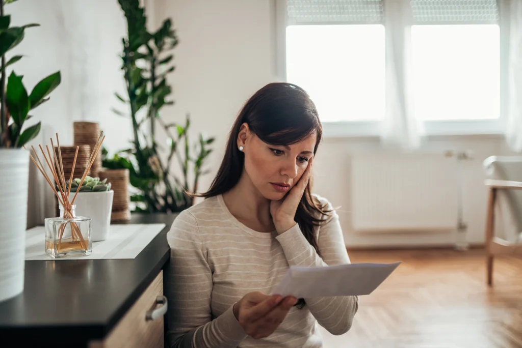 Woman reading an IRS notice.