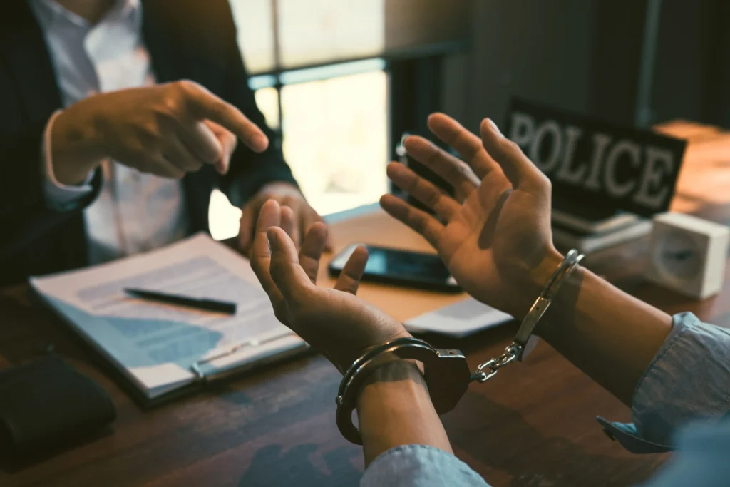 Man in handcuffs.