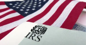 IRS document with the American flag, symbolizing civil penalties.