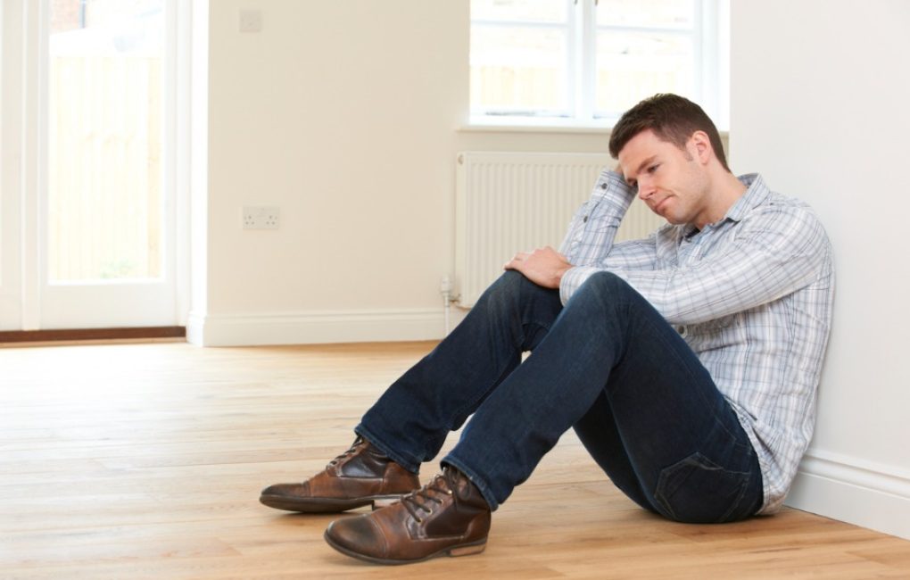 Sad Man In Empty House Thinking About His Irs Property Seizure